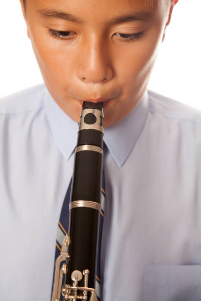 clarinete de play boy - musician clarinet teenager asian ethnicity fotografías e imágenes de stock