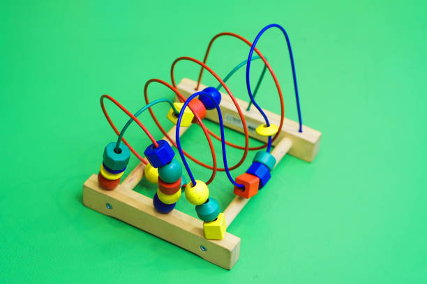 istock children's abacus on the floor. isolated on background. Scores 658129028