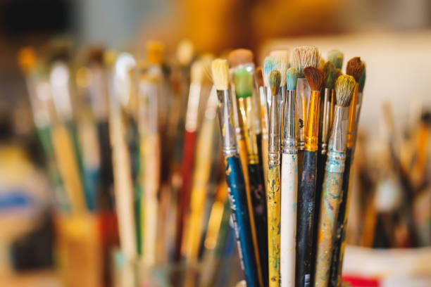istock Paint Brushes isolated in blur background, close-up 658129524