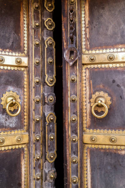 istock Close up of a slightly opened ancient door, Jaipur 658130542