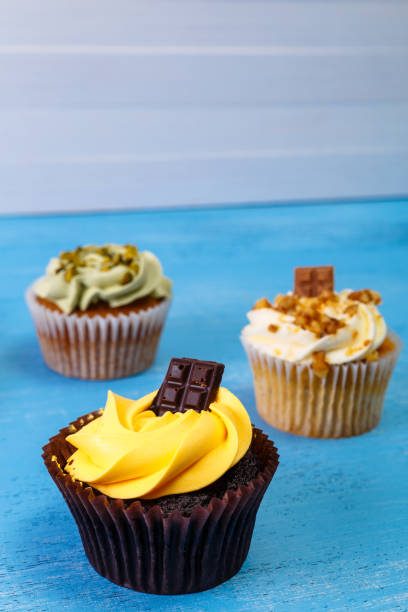 istock Cupcakes with buttercream. Sweet cake with cream. 658131064