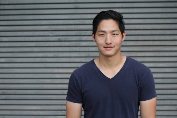 istock Asian Man Portrait Smiling Isolated with CopySpace 658141192