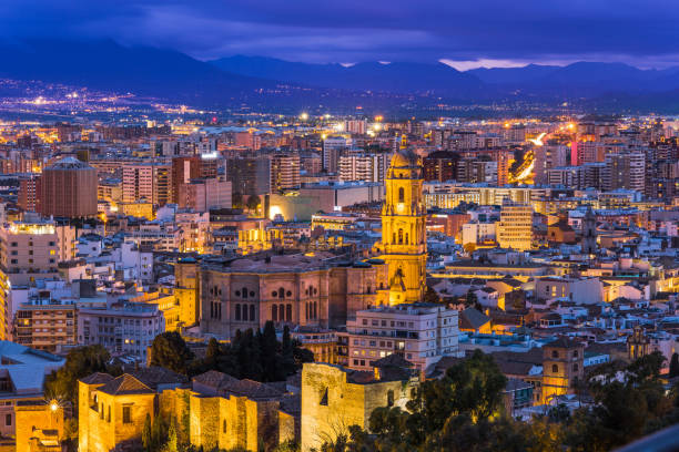 istock Malaga cathedral and cityscape at twilight 658142426