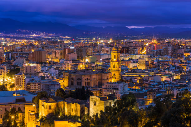 istock Malaga cathedral and cityscape at twilight 658145666