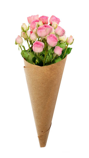 istock Small pink rose flowers in a paper cornet 658155672