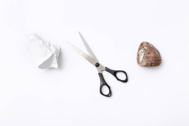 istock Rock, paper, scissors is best choice way to decision making 658164592