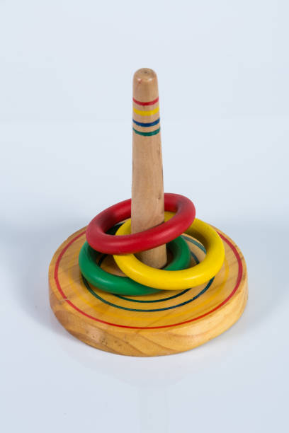 istock Quoits, wooden toy isolated on white background 658168528