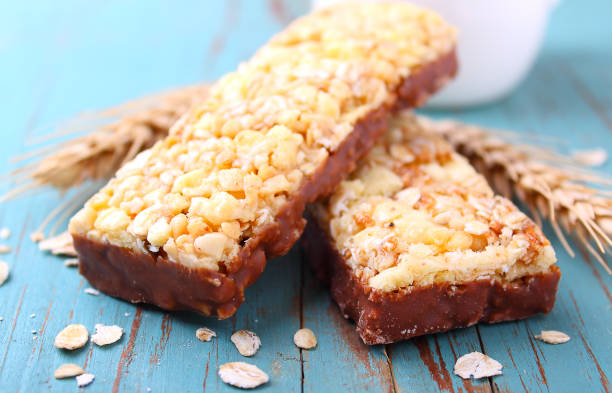 istock muesli bars with raisins and nuts on a blue background 658171440