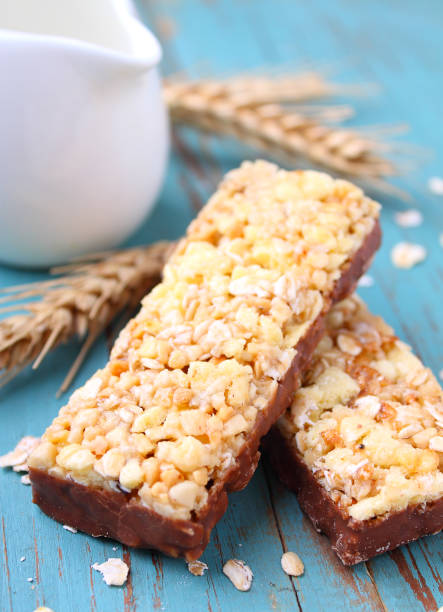 istock muesli bars with raisins and nuts on a blue background 658171482