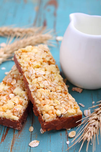 istock muesli bars with raisins and nuts on a blue background 658171596