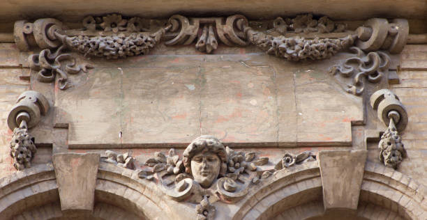 istock architecture detail with  human head and flowers 658175616