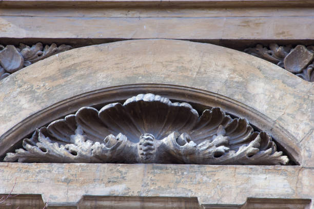 istock Brown architecture detail with stucco leaves 658175666