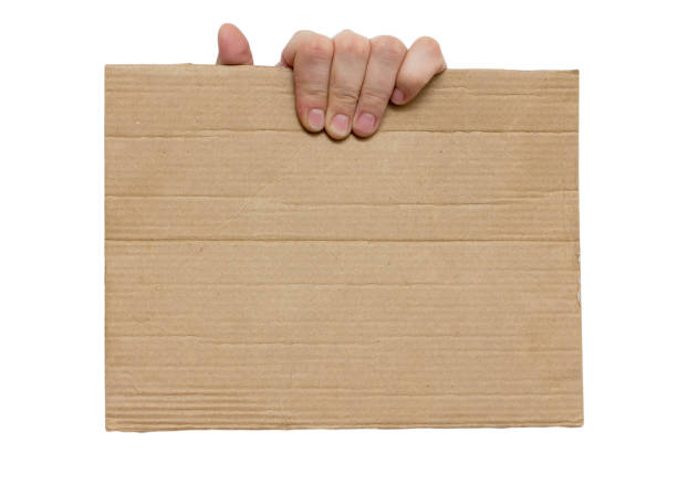 istock cardboard frame in the hands on a white background 658181472