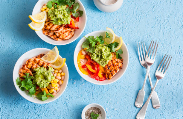 istock Chicken fajitas bowls on a blue background, top view. Flat lay 658181562