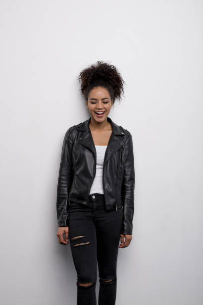 istock Laughing brunette woman with her eyes closed 658185900