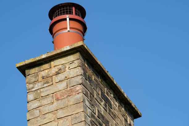 istock Detailed view of an old chimney stack as seen on an old cottage. 658185966