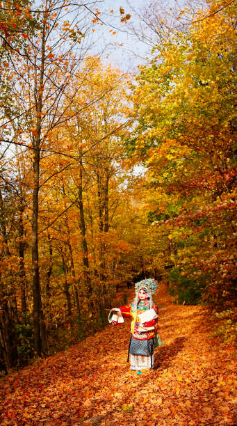 A Chinese Opera performer in the fall outdoor park, Toronto, Canada