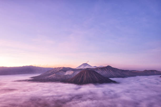 istock Bromo, Batok and Semeru volcanoes at sunrise, Java island, Tengger Semeru national park, East Java, Indonesia 658189476