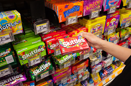 New York City: A package of Original Fruit Skittles in the supermarket, fruit-flavoured candies produced and marketed by the William Wrigley Jr. Company.