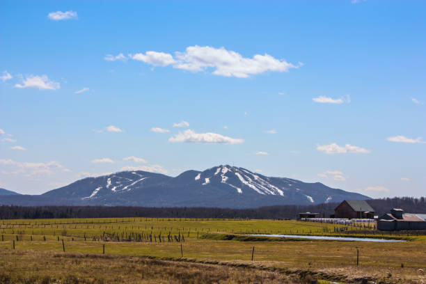 istock ski mountain in spring with agricultural field 658192716