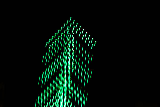 green arrows on black background, going forward