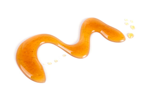 istock Honey stain isolated on a white background 658199254