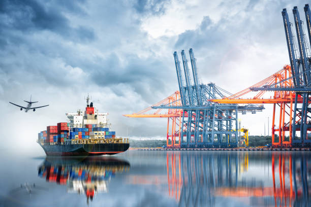 istock Container Cargo ship and Cargo plane with working crane bridge in seaport , logistic import export background and transport industry. 658202526