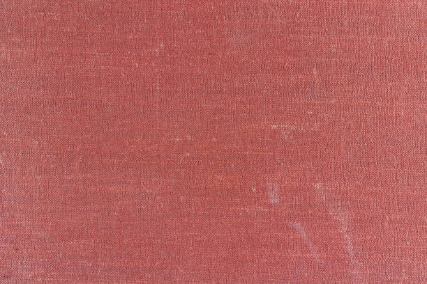 istock Old red textile texture with stains and fading. Abstract background 658213086