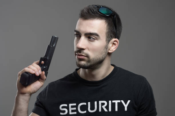 Gun Over Back 60+ Man Looking Back Gun Stock Photos, Pictures & Royalty-Free Images ...