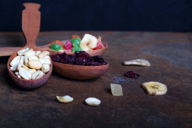 istock Peanuts, raisins and candied fruits - healthy breakfast 658219320