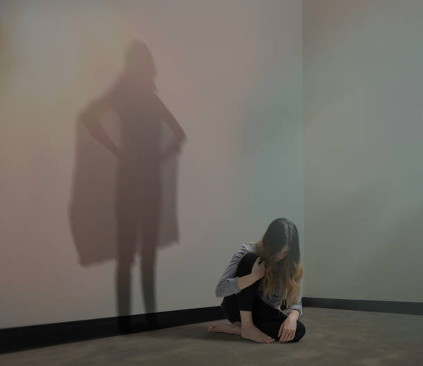 istock Woman shadow is confident and brave 658221322