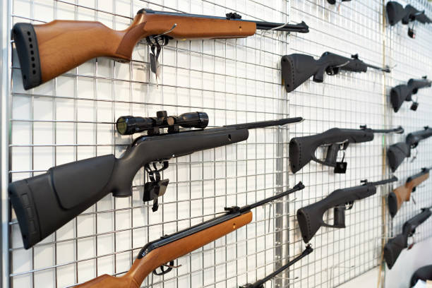 istock Air guns on stand in shop 658223638