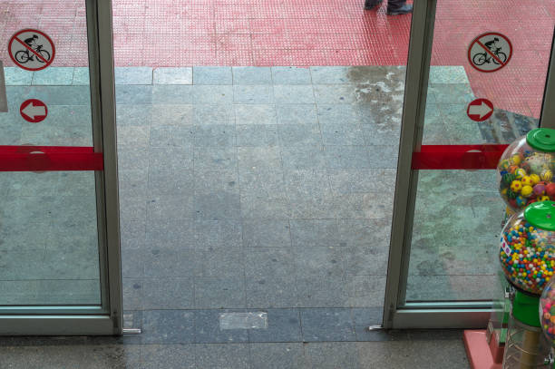 Open automatic door at the entrance of a shopping mall stock photo