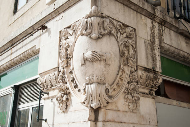 istock Old sculpture of handshake 658230454