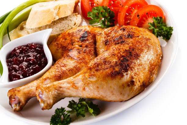istock Roast chicken legs and vegetables 658233688