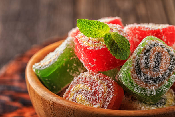 istock Turkish delight on dark wooden background 658233742