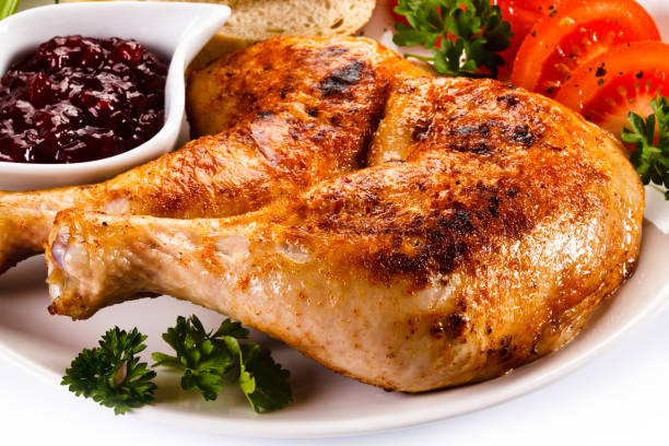 istock Roast chicken legs and vegetables 658236020