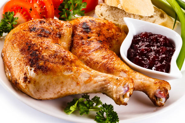 istock Roast chicken legs and vegetables 658236144