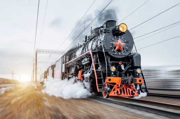 istock Vintage black steam locomotive train rush railway 658242852