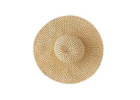 Wide-brimmed straw hat, isolated on white background, close-up.