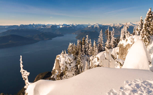 Picture was taken from viewpoint along Howe Sound Crest Trail, one of most beautiful and rugged hiking trails on this planet.  Across the Howe Sound is Sechelt Peninsula and snowy peaks of Tantalus Mountain Range