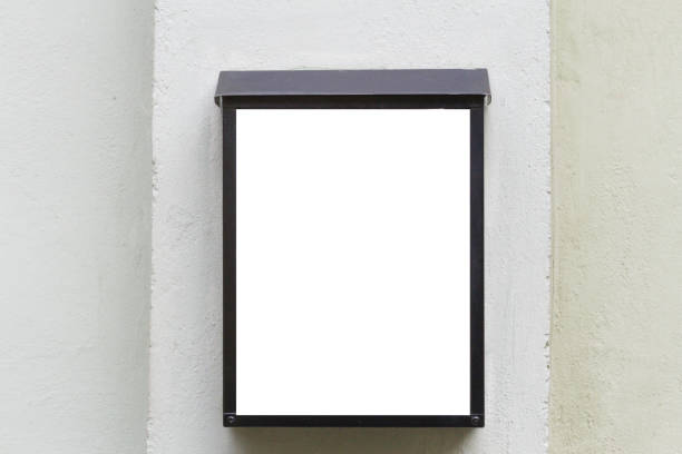 istock Mock up. Blank billboard outdoors, outdoor advertising, public information board on grey wall. 658256092
