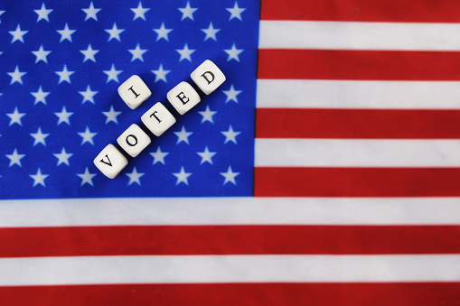 election simbol on usa flag with letter wooden cubes