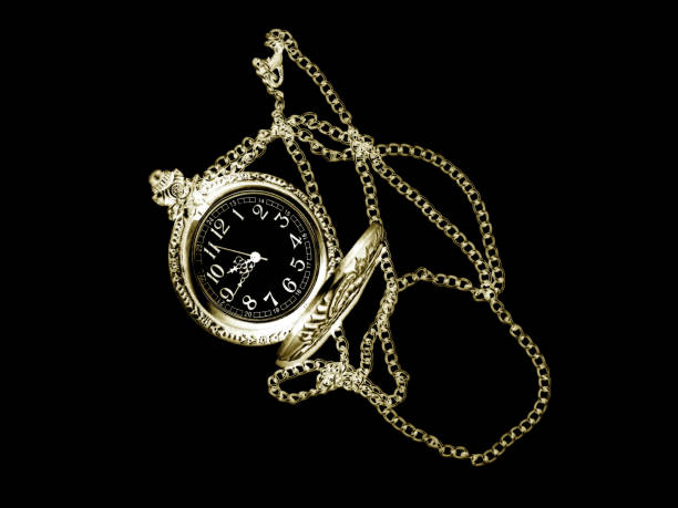 istock Vintage clock with chain on a black background 658270274
