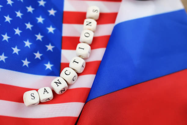 istock russian and usa flag sanctions 658270312