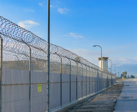 Walk south along the west facing prison fence