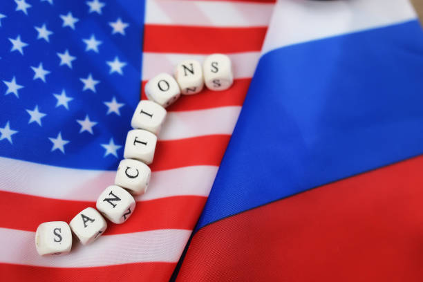 istock russian and usa flag sanctions 658270436