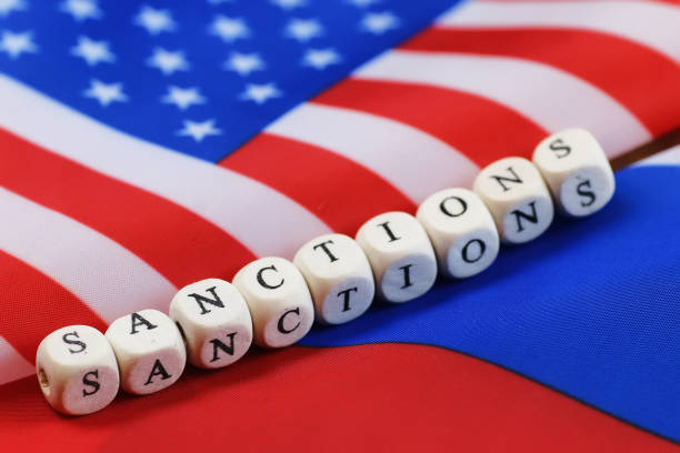 istock russian and usa flag sanctions 658270556