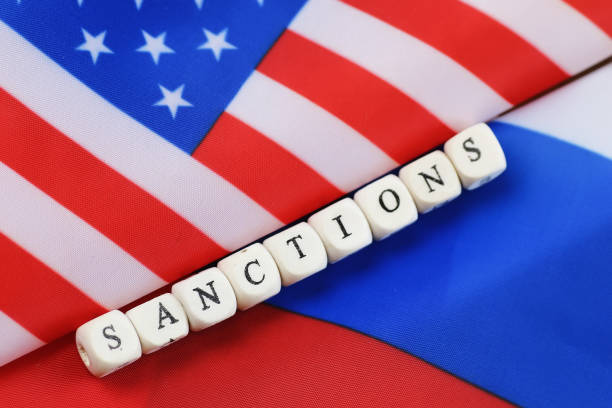 istock russian and usa flag sanctions 658270700