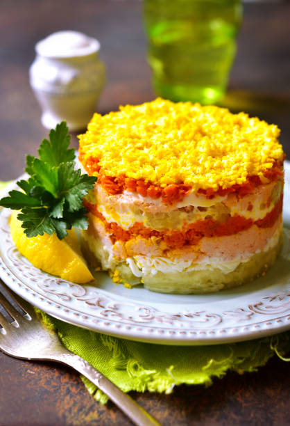 istock Layered salad with vegetables and salmon 